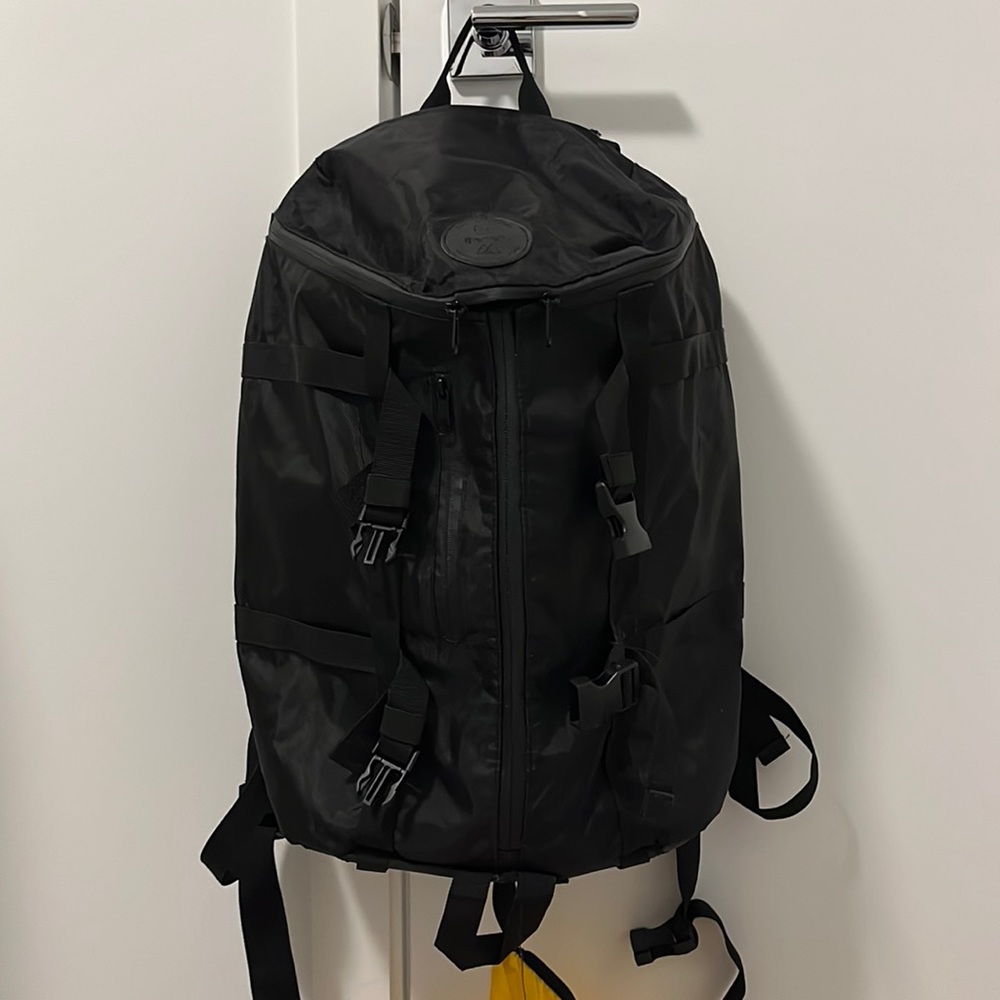 Bench black backpack with yellow waterproof cover built in